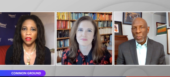 Three people conduct an interview