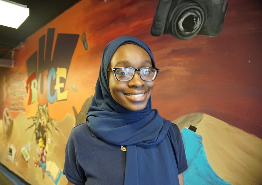 Student in blue head scarf