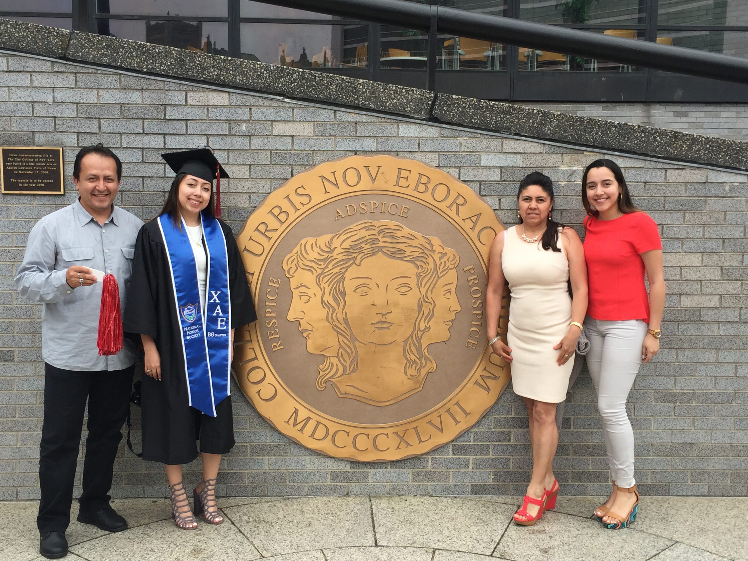 Tiffany Gallegos with members of her family at her college graduation.